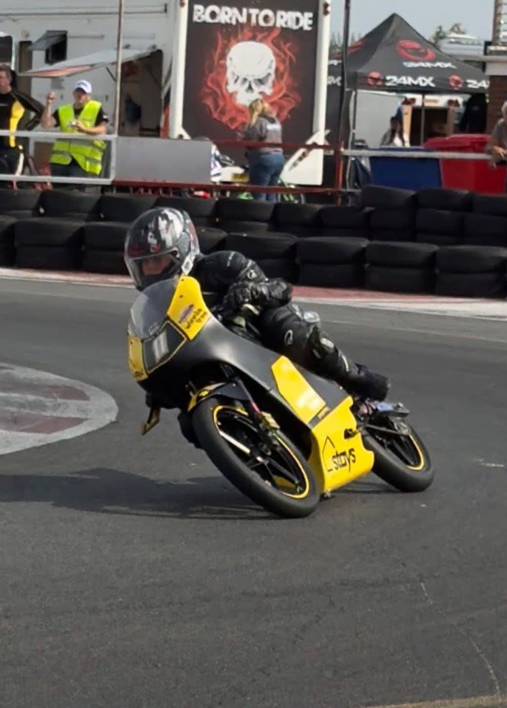Ted leaning the bike into a corner