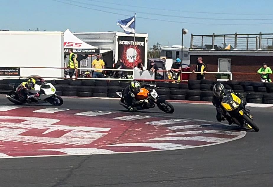 Ted racing in a pack of riders