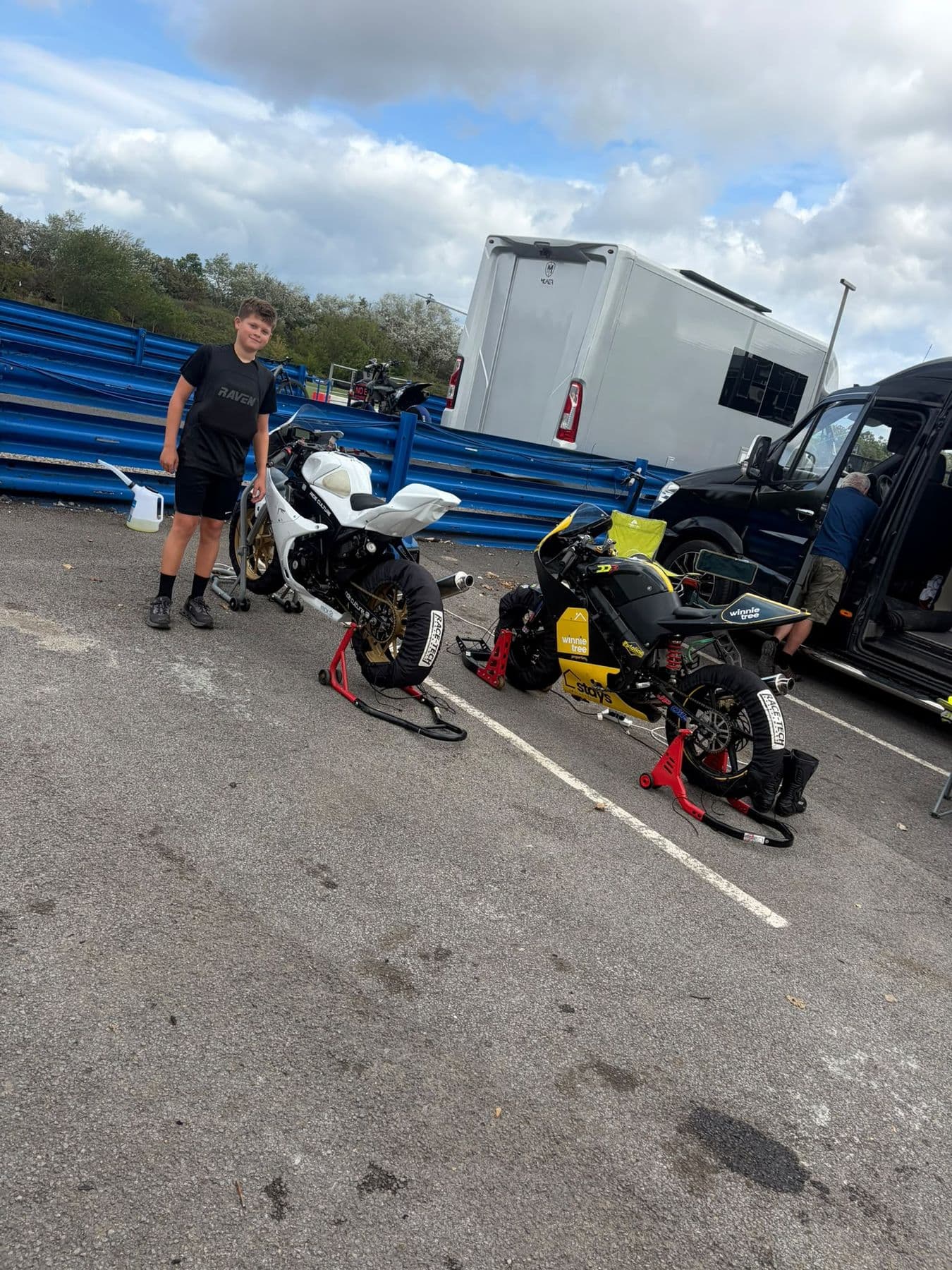 Ted with the bikes in the paddock