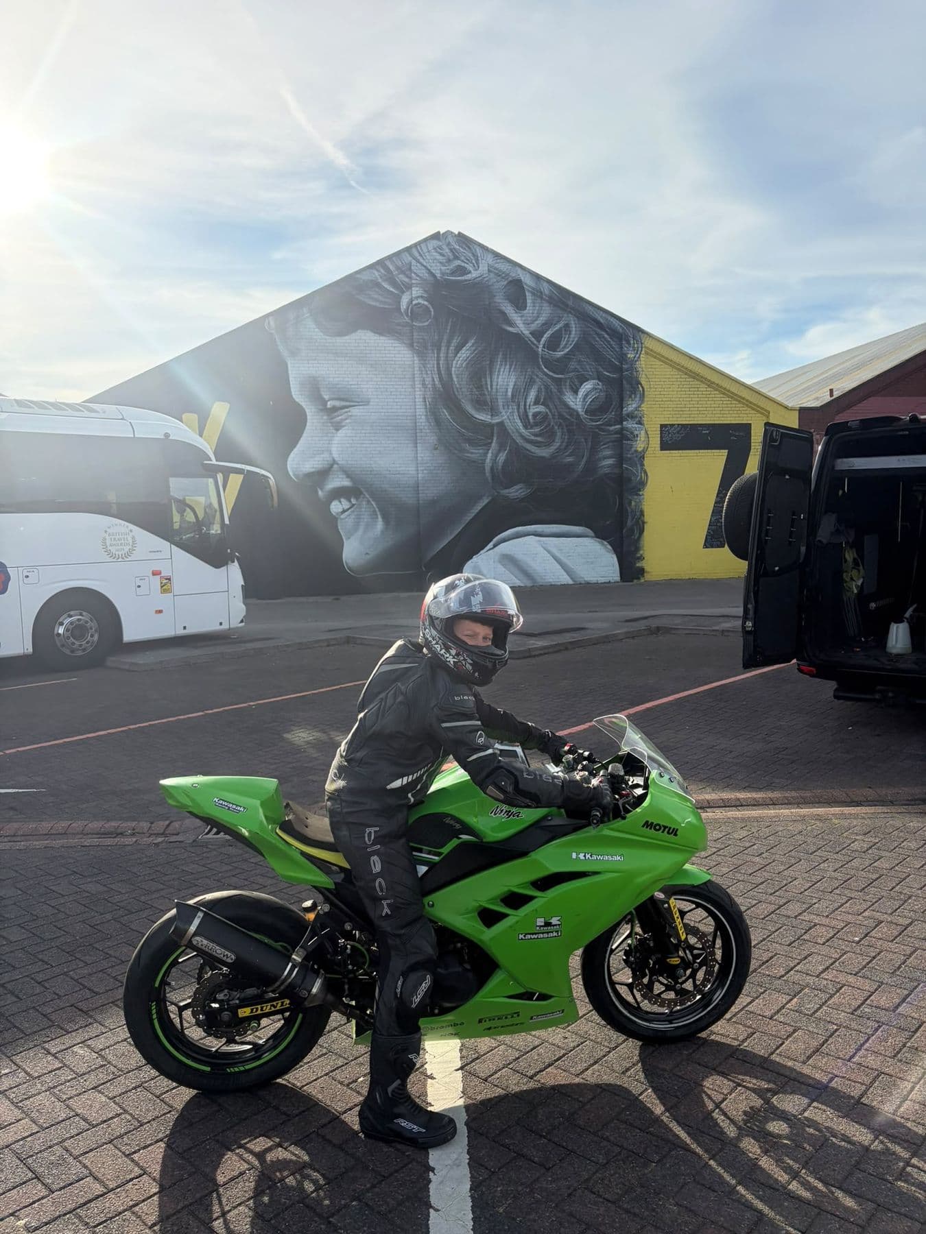 Ted on a green Kawasaki in the paddock