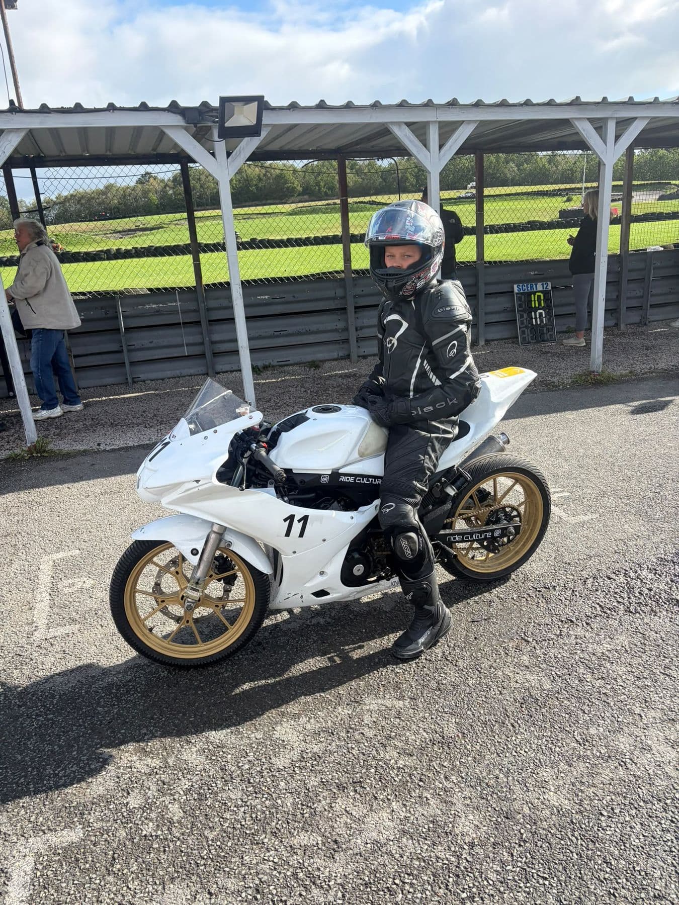 Ted on the white #11 in the pit lane