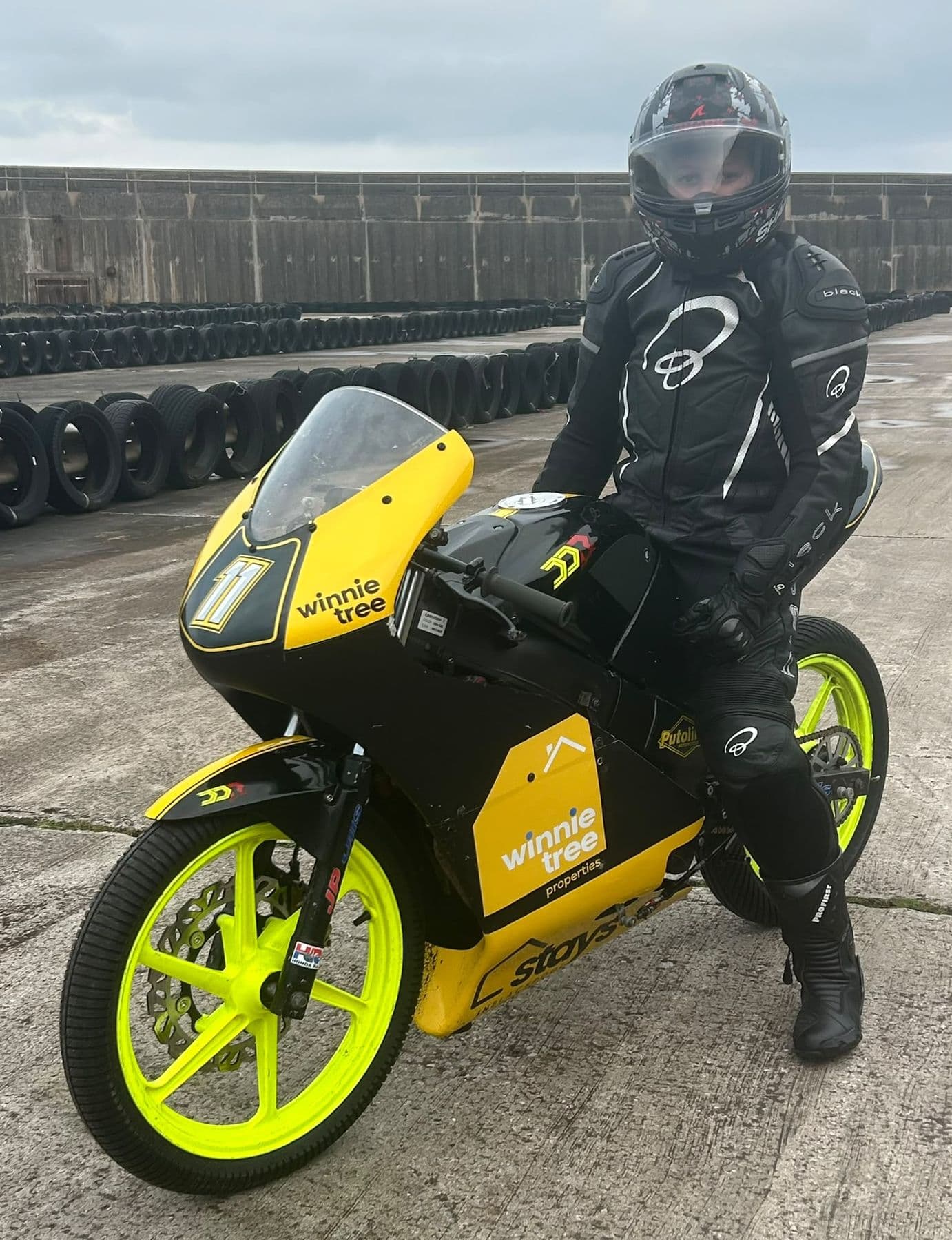 Ted sitting on the #11 in full leathers