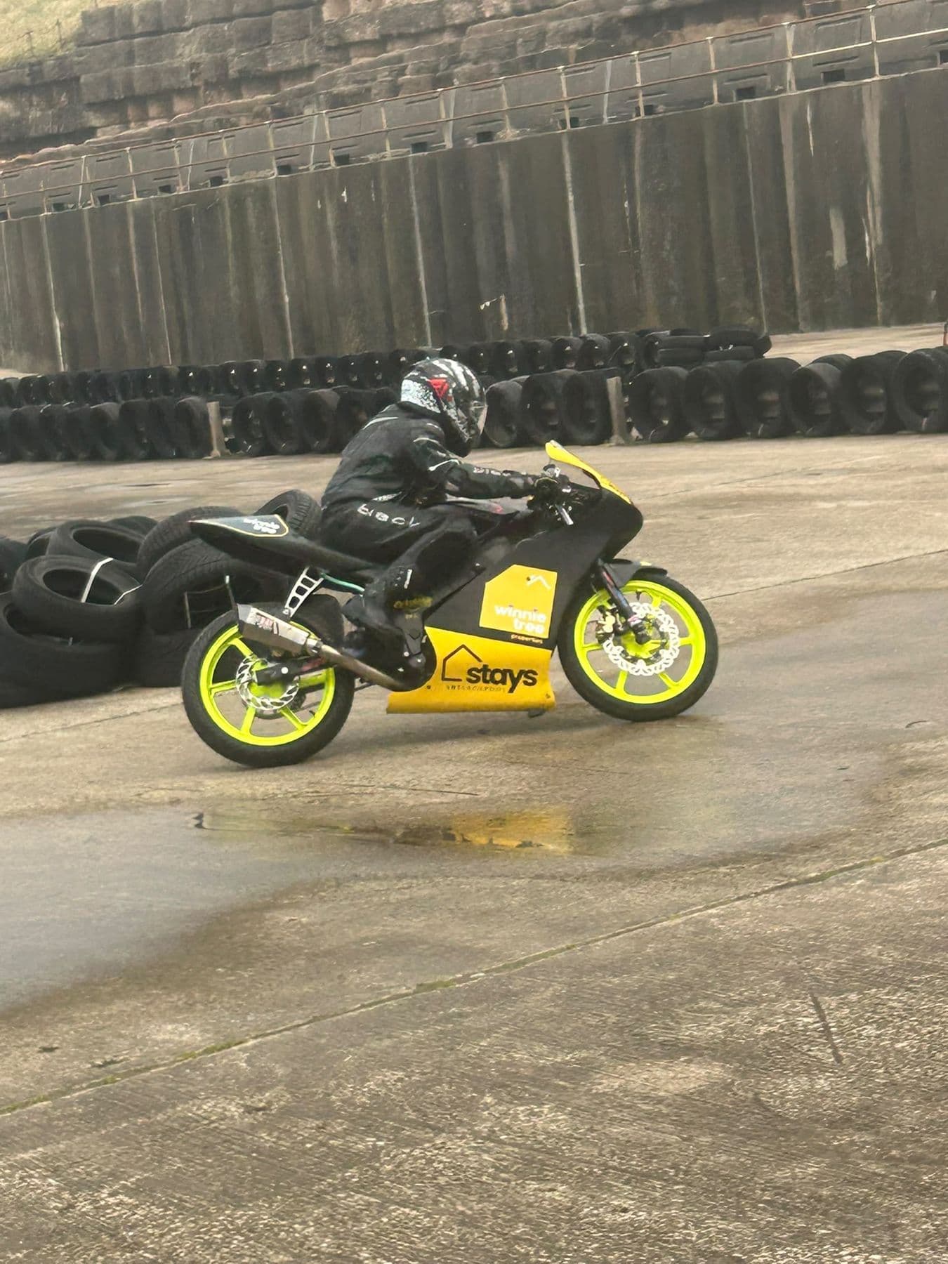 Ted riding through standing water at a training session
