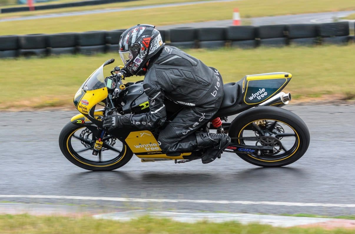 Ted at speed on a wet circuit